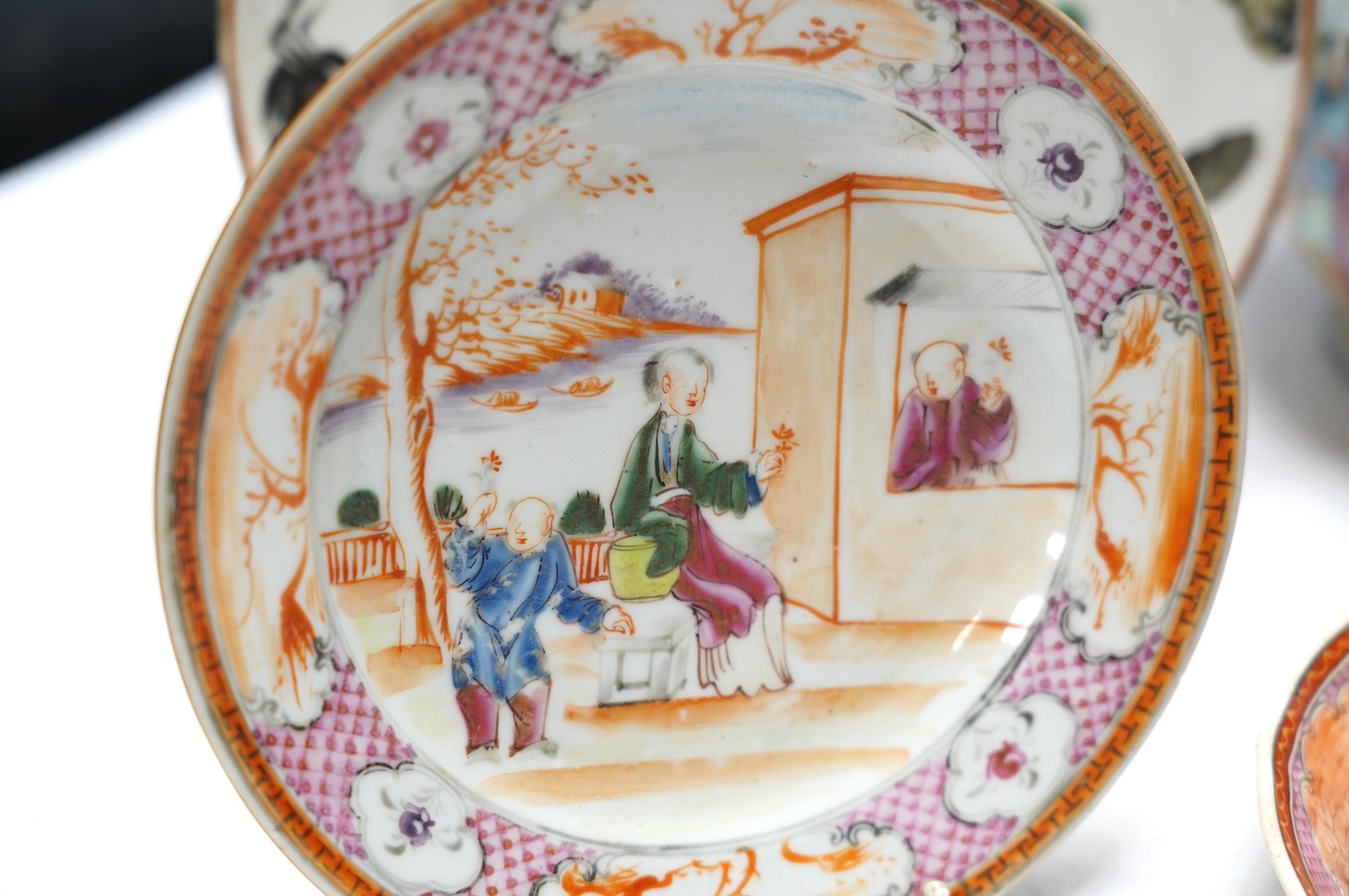 A 19th century Chinese famille rose bottle vase together with four plates, vase 28cm high. Condition - ranging from fair to good